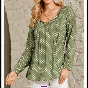 Green polka dot blouse